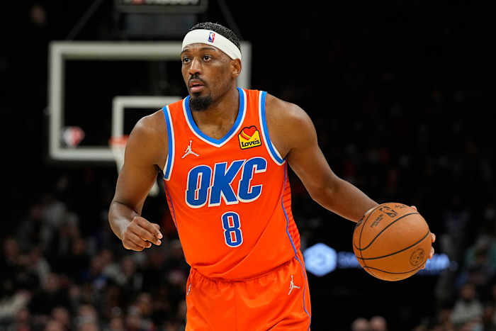 Oklahoma City Thunder guard Paul Watson (8) dribbles the ball against the Phoenix Suns in the second half at Footprint Center.
